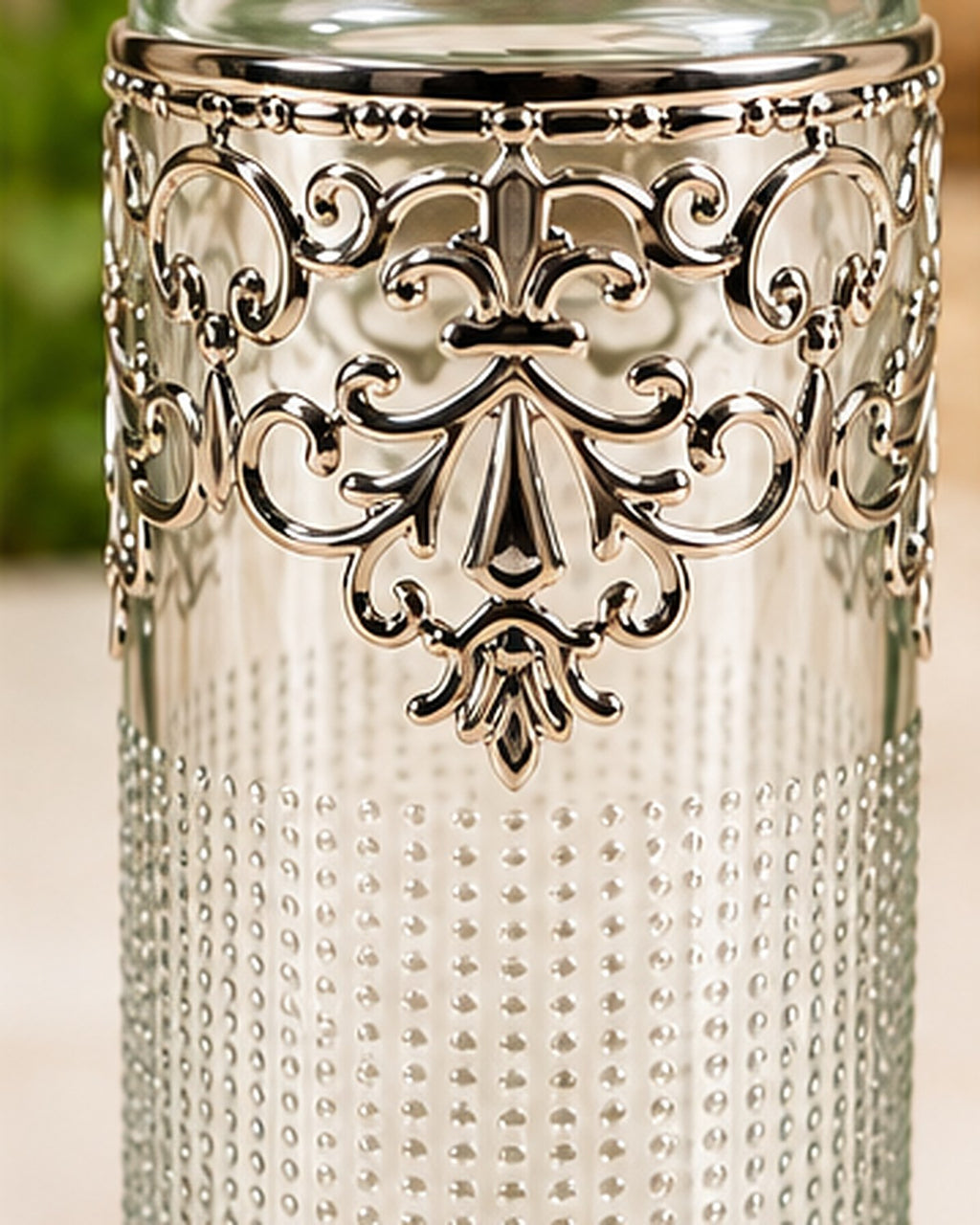Detail of the pierced German Silver filigree scrollwork at the bottle shoulder