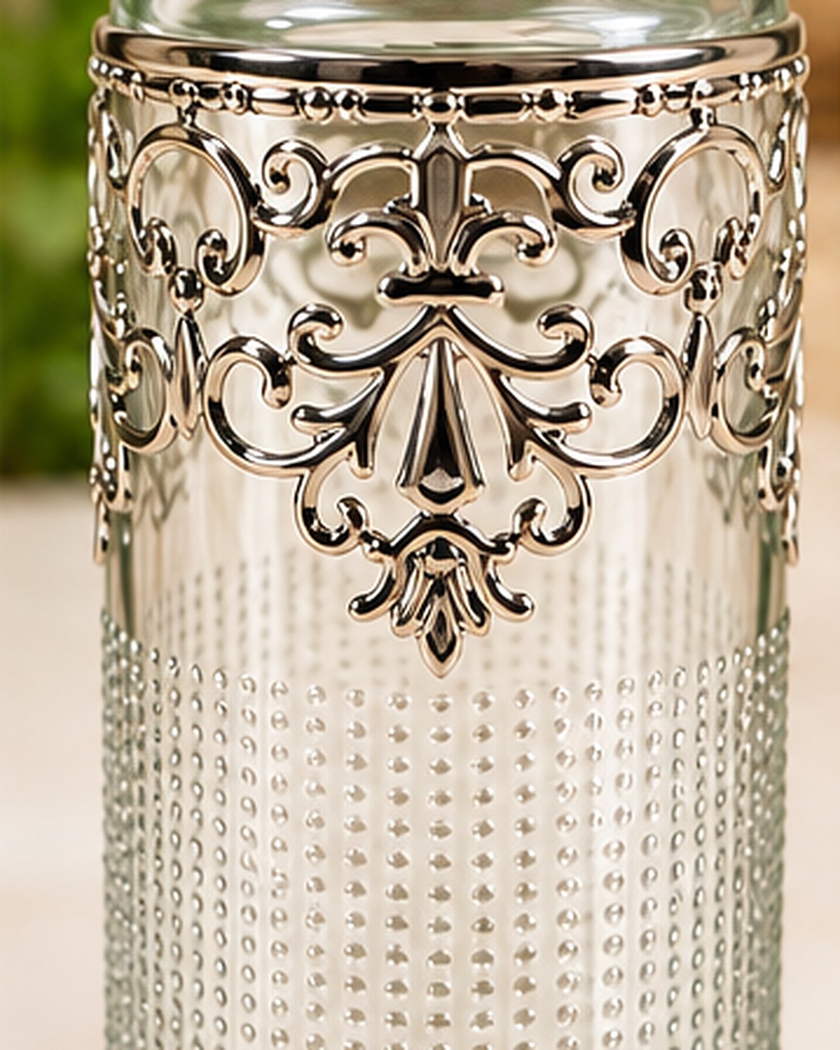 Detail of the pierced German Silver filigree scrollwork at the bottle shoulder
