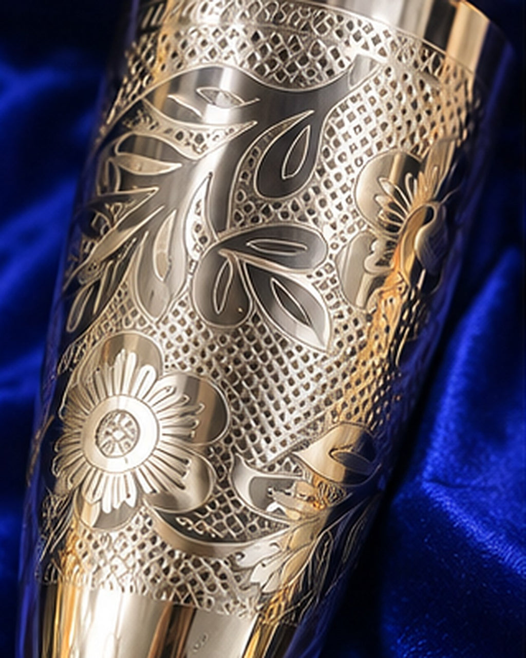 Hand-engraved floral band on the German Silver bowl over a cross-hatched ground