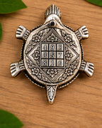 Base of the tortoise showing the Kubera yantra magic square, 4 9 2 3 5 7 8 1 6