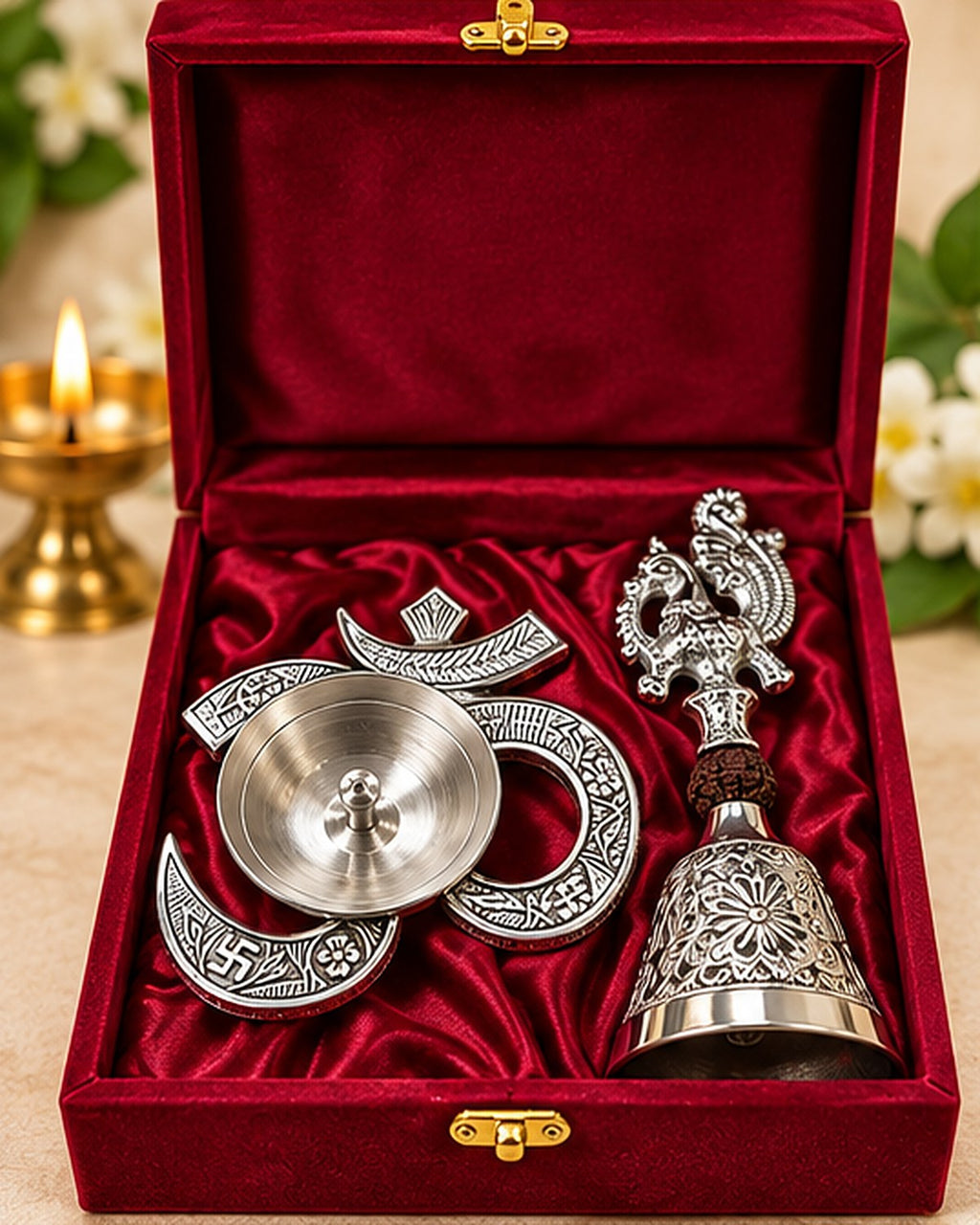 German Silver Om diya and peacock pooja bell in a red velvet gift box