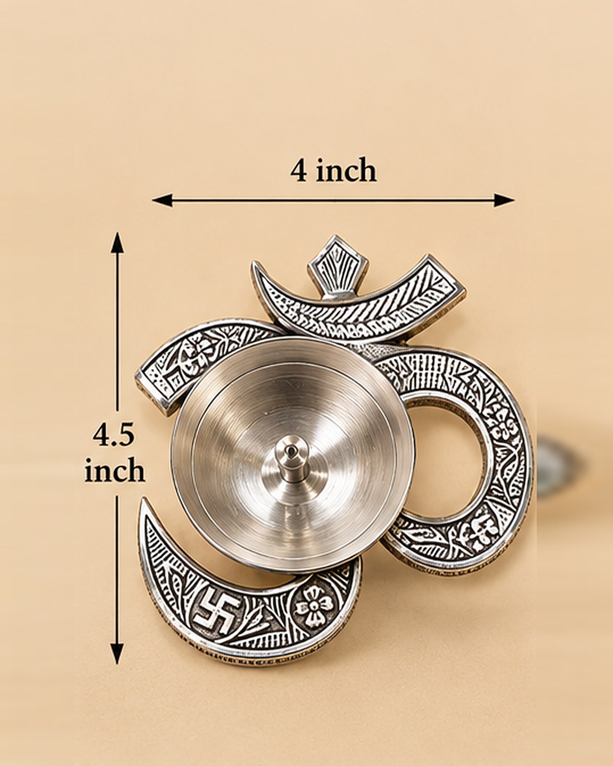 Size chart: the Om diya measures 4 inches wide and 4.5 inches tall